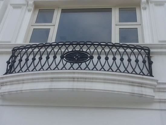 Wrought Iron Stair Railing, Entrance Gate, and False Balcony Railing Wrought Iron Stair Railing, Entrance Gate, and False Balcony Railing